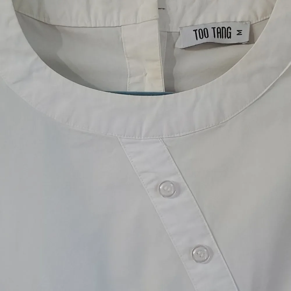 Blouse by TOO TANG,‎ Size medium. Beautiful enbroidery. 3/4 sleeves. Artsy